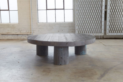 round circle gray cocktail table in open room